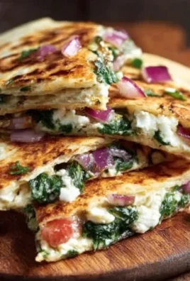 Mediterranean Quesadillas with Spinach, Feta, Mozzarella, and Red Onion