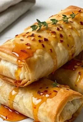 Indulgent Oven Fried Feta Rolls with Chili Honey Magic
